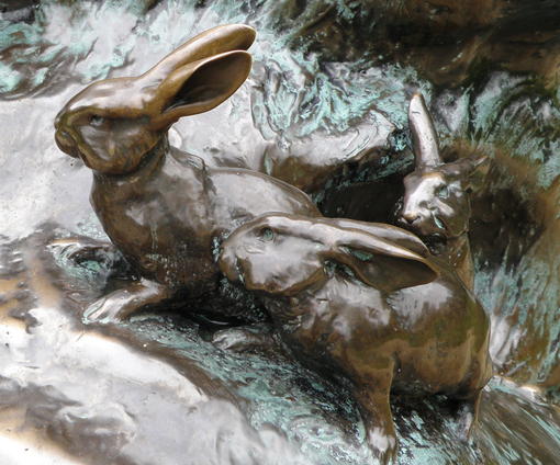 Close up detail of 3 rabbits at the base of Sir George Frampton's Peter Pan statue